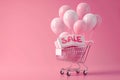 Shopping cart with sign SALE and inflatable helium balloons on pink background. Sale, Black Friday concept, shopping season,