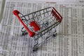 Shopping Cart On The Stock Price Page Of Newspaper
