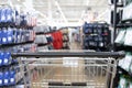 Shopping cart in supermarket, Abstract blurred photo in shopping malls Royalty Free Stock Photo