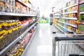 Shopping cart in supermarket, Abstract blurred photo in shopping malls Royalty Free Stock Photo