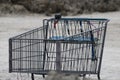 A shopping cart turns up in a mountain of removed dirt from the I-635 upgrades