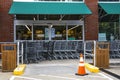Shopping carts block a second entrance at a Publix supermarket during covid-19 and protests