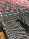 Shopping carts shopping carts in a row to buy food and other goods in front of a mall or a big shopping center