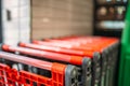 Shopping carts in supermarket closeup, nobody Royalty Free Stock Photo