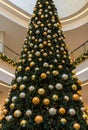 Shopping center- tall Christmas tree decorated baubles