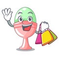 Shopping colored easter egg in cup cartoon Royalty Free Stock Photo