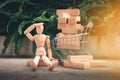 Shopping concept, Mini wooden model is resting in front of troll