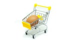 Single egg in yellow mini shopping cart or supermarket trolley isolated on white background. Royalty Free Stock Photo