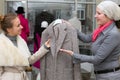 Shopping at Department Store Customer and Saleslady interacting