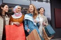 Shopping. Diversity Women Bonding Bags. Smiling Multicultural Girls Walking Near Mall.