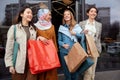 Shopping. Diversity Women Holding Bags. Smiling Multiethnic Girls Standing Near Mall. Royalty Free Stock Photo
