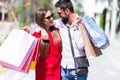 Happy young couple shopping in the city Royalty Free Stock Photo