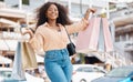 Shopping, fashion and retail, a black woman with smile and designer boutique shopping bags outside a mall. Happy Royalty Free Stock Photo