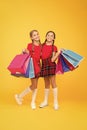 Shopping with friend. Children hold packages. Best day ever. Girls with shopping bags. Rediscover great shopping Royalty Free Stock Photo