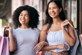 Shopping, friends and customer women with shopping bags in the city about retail sales and discount. Urban shopping mall