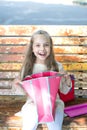 Shopping. happy little girl kid with shopping bag Royalty Free Stock Photo