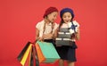 Shopping and holidays. For my dear friend. Girl giving gift box to friend. Girls friends celebrate holiday. Children