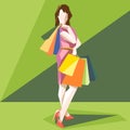 Shopping lady in a pink dress and red shoes