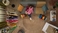 Top view close up shot of man and girl on the couch in the living room holding smartphone, showing new clothes to Royalty Free Stock Photo