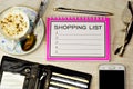Shopping list-plan to buy a gift in stores at a discount at competitive prices. Laptop for business strategy, glasses, pen for Royalty Free Stock Photo