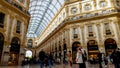 Shopping mall customers in Galleria Vittorio Emanuele, tourism, architecture Royalty Free Stock Photo