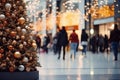 Shopping mall decorated for Christmas time. Crowd of people looking for presents and preparing for the holidays Royalty Free Stock Photo