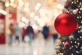 Shopping mall decorated for Christmas time. Crowd of people looking for presents and preparing for the holidays Royalty Free Stock Photo