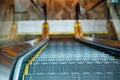 Shopping mall escalator downwards view