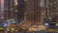 Shopping mall exterior with reastaurants day to night timelapse in Dubai, United Arab Emirates