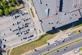 Shopping mall of household goods with rows of cars on parking lot. aerial view