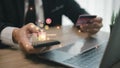 Shopping online payment concept. Man hand using smart phone with cart delivery icon, banking and online shopping via banking Royalty Free Stock Photo