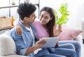 Young Couple Using Tablet And Credit Card At Home Royalty Free Stock Photo