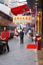 Shoppers and bus stop, Nathan Road, Hong Kong Royalty Free Stock Photo