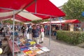 Shopping people at market stalls of historic book fair