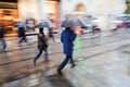 Shopping people in the rainy city