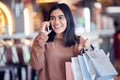 Shopping, phone call and Indian woman in mall with smile for communication, conversation and chat. Retail, fashion and Royalty Free Stock Photo