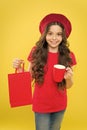 Shopping and purchase. Black friday. Shopping day. Child hold package. Girl with shopping bag. Save money. Live better