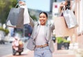 Shopping, retail and celebration with a young woman and consumer in the city after spending money in a store, shop or Royalty Free Stock Photo