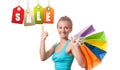 Shopping Sale. Happy woman is holding shopping bags. Royalty Free Stock Photo