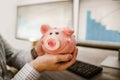 Man holding piggy bank Royalty Free Stock Photo