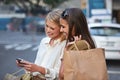 Shopping, smartphone and urban friends happy for sale announcement, women clothes deal or online retail promotion. Store