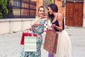 Shopping with a smile. Shopping fun. Shopping and perfect mood. Beautiful girl with shopping bags