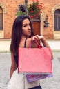 Shopping with a smile. woman with shopping bags