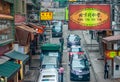Shopping Street with car traffic and medicine shop, Hong Kong Island, China