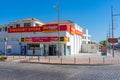 Shopping street with a discount store in Ayia Napa in Cyprus with little traffic on a summer day in September 2023