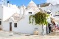 Shopping street with typical Trulli houses in Alberobello, Apulia, Italy