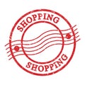 SHOPPING, text written on red postal stamp Royalty Free Stock Photo