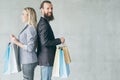 Shopping therapy happy delighted couple hold bags Royalty Free Stock Photo