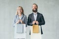 Shopping therapy happy smiling couple hold bags Royalty Free Stock Photo