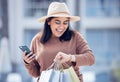 Shopping, time and Indian woman with phone in city with bag for adventure, rushing and hurry. Retail, fashion and female Royalty Free Stock Photo